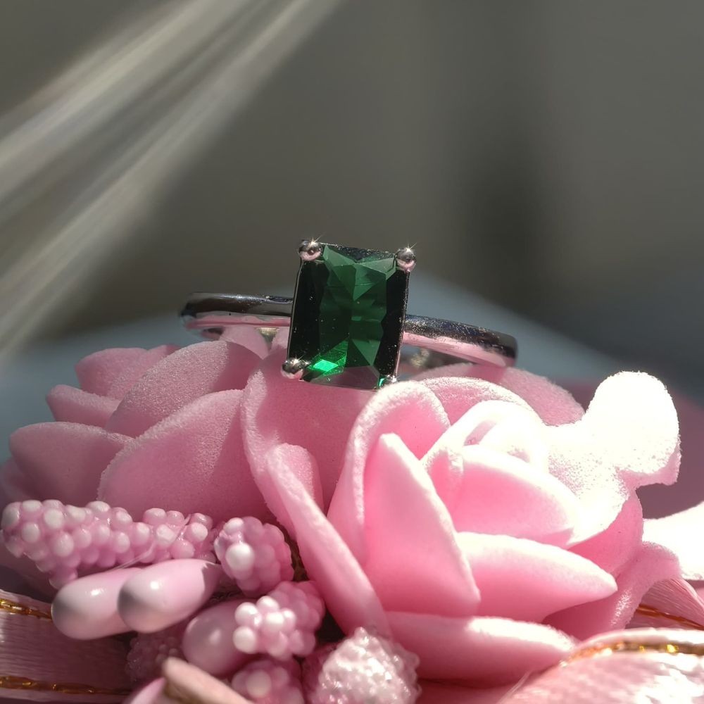 Elegant Emerald Solitaire Ring